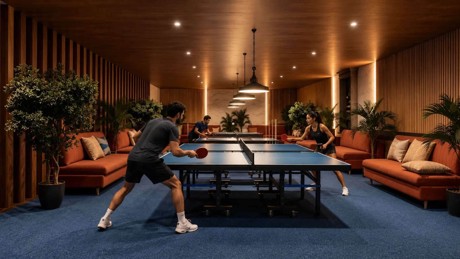 Artistic impression of the indoor games lounge at Tru Aquapolis, with a table tennis table and sofas